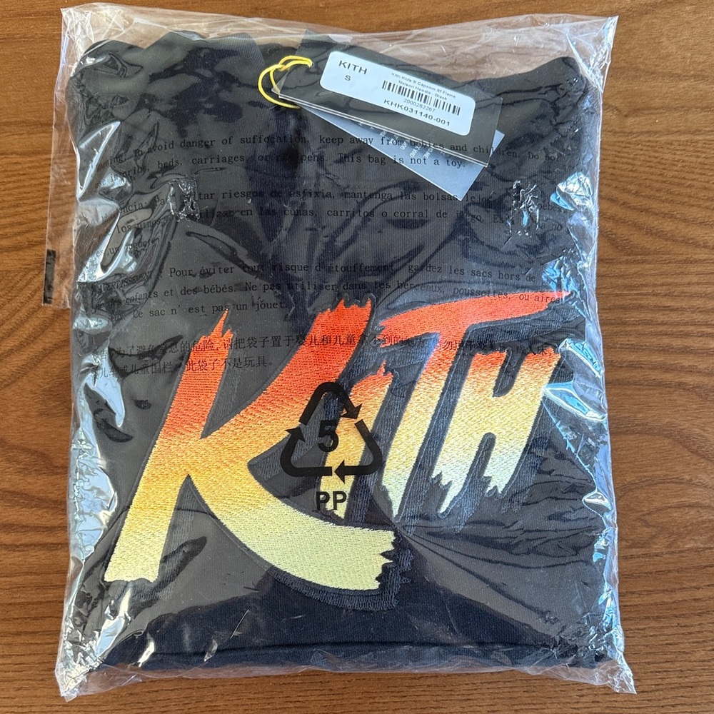 Kith Kids Black Sweatshirt with Orange-to-Yellow Gradient Logo